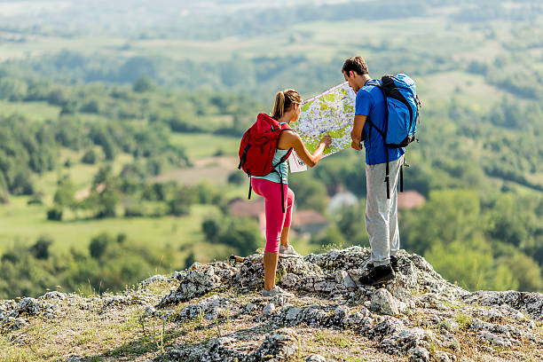 istock Young couple hiking on the mountain 521139813