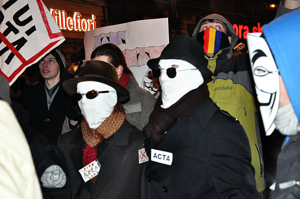 Riot against Government Cluj Napoca, Romania - February 11, 2012: Hundreds of people protesting against Acta, against web piracy treaty, and the government in Cluj Napoca ostentation stock pictures, royalty-free photos & images