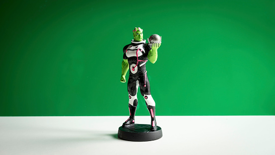 Kuala Lumpur, Malaysia - October 29, 2014: Slightly defocused and closeup hand painted figurine of Brainiac, a super-intelligent alien being from the planet Colu who fought Superman