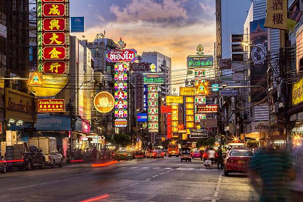China Town at Yaowarat Road BANGKOK - JUNE 9: The China Town at Yaowarat Road. Attractive light at night, Thailand on June 9, 2014. bangkok street stock pictures, royalty-free photos & images