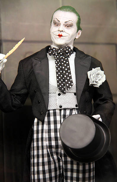 1989 Mime Joker Vancouver, Canada - October 12, 2014: Action figure model of the Joker, released by DC comics, against a black background. famous villains stock pictures, royalty-free photos & images