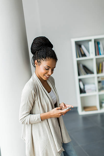 istock Pretty young woman in the office 521179643