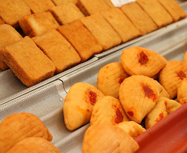 istock Fried panzerotti and bread sold at the market 521179673