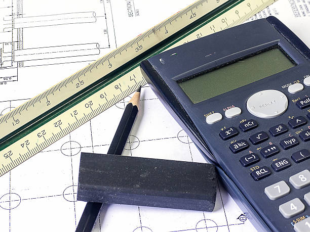 istock Construction Concept. Blueprint, Tape and ruler Calculator. 521181375