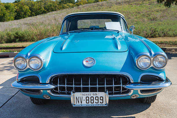 Turquoise 1959 Chevrolet Corvette Convertible classic car Westlake, Texas, USA - October 18, 2014: A turquoise 1959 Chevrolet Corvette Convertible is on display at the 4th Annual Westlake Classic Car Show. Front view. 1959 photos stock pictures, royalty-free photos & images