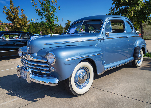 Westlake, Texas, USA - October 18, 2014: A blue 1948 Ford Super Deluxe Coupe is on display at the 4th Annual Westlake Classic Car Show. Front side view.