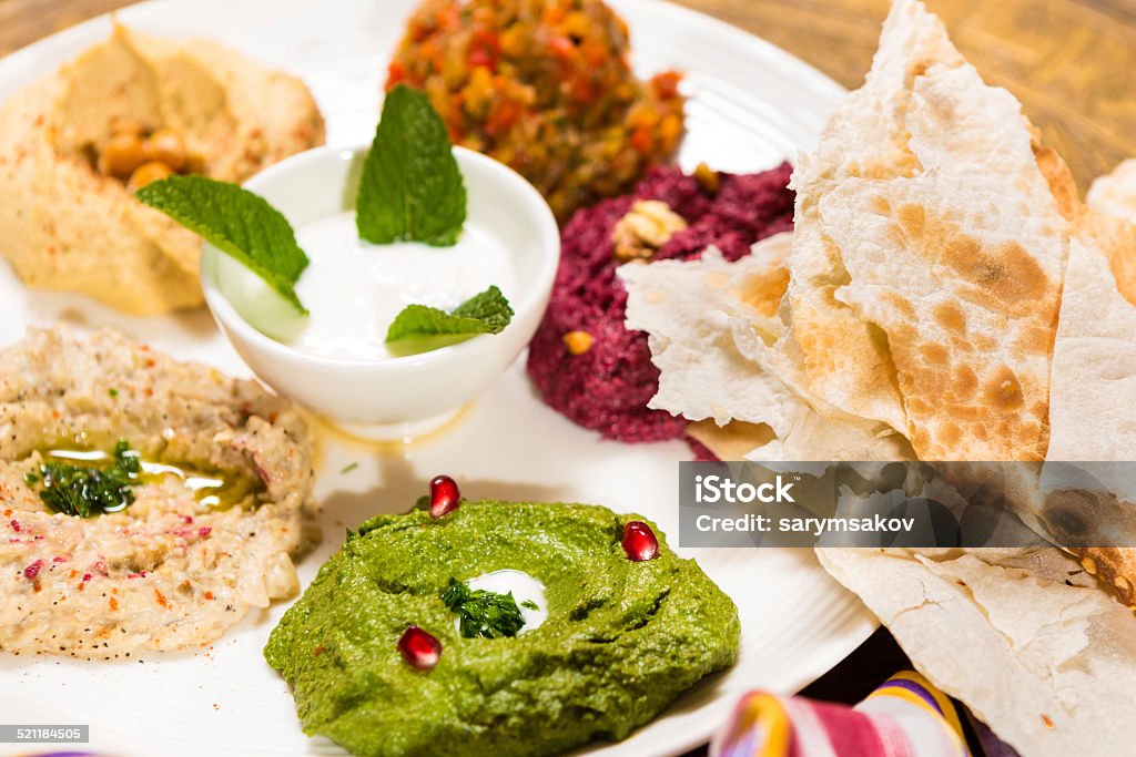 assorted of oriental food, mezze assorted of oriental food on the table Bean Stock Photo