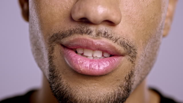 Lips of a young African-American male talking