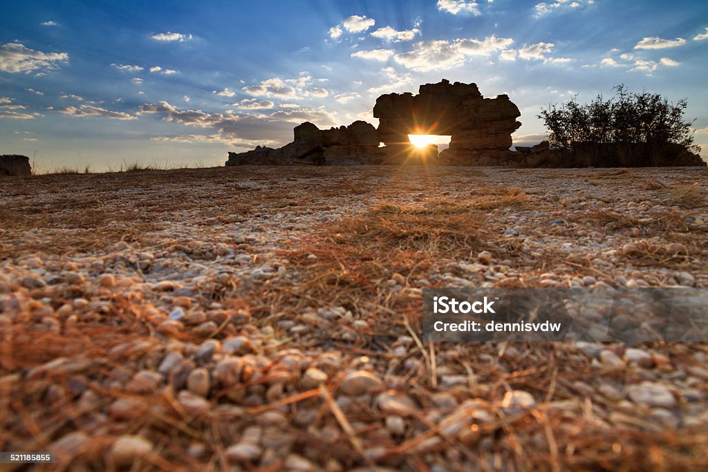 Window ground Sunset at the famous rock formation 'La Fenetre' near Isalo, Madagascar. Arrangement Stock Photo
