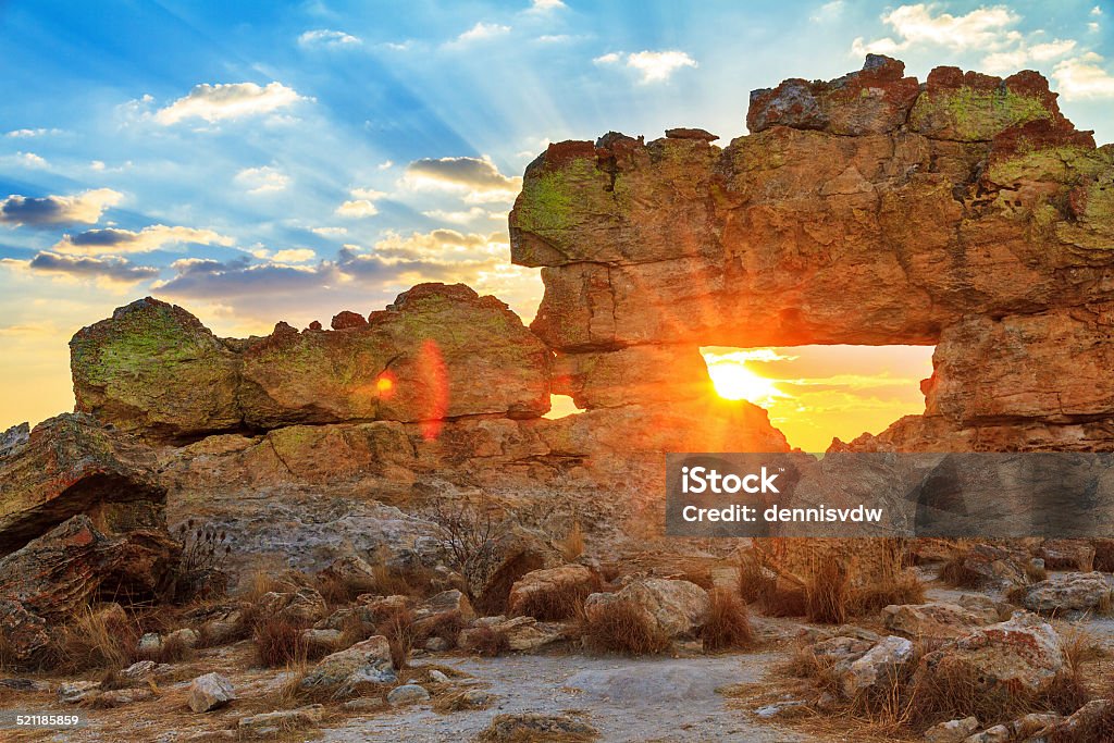 The window Sunset at the famous rock formation 'La Fenetre' near Isalo, Madagascar. Arrangement Stock Photo