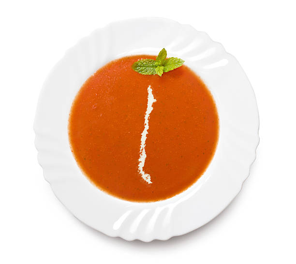 istock Plate with tomatosoup and cream (shape of Chile) 521186287