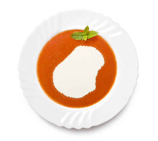 istock Plate with tomatosoup and cream (shape of Nauru) 521186327