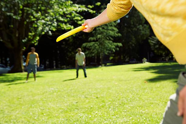 istock Person preparing to throw a flying disc 521197452