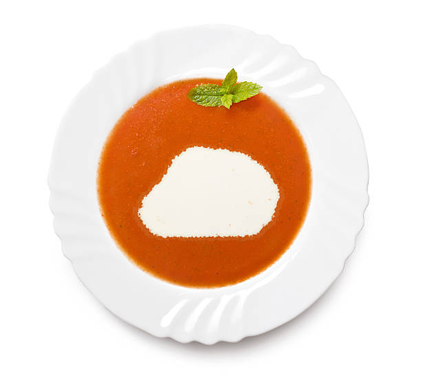 istock Plate with tomatosoup and cream (shape of Baker Island) 521198463