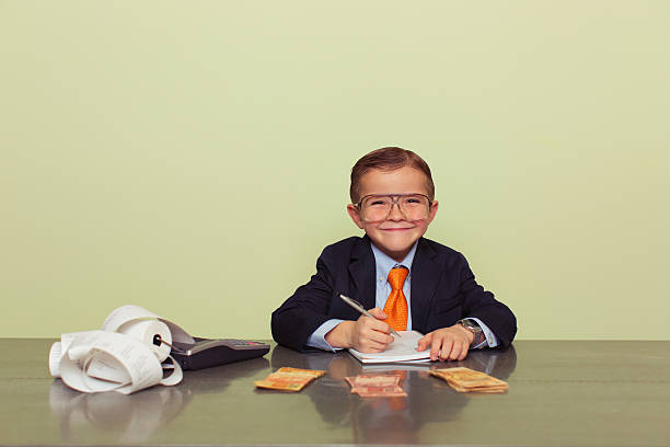 istock Young Brazilian Boy Accountant with Money 521199786