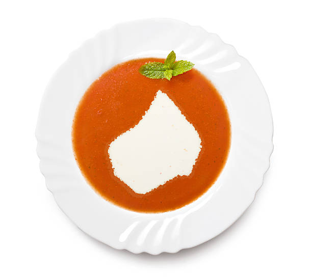istock Plate with tomatosoup and cream (shape of Lesotho) 521199929