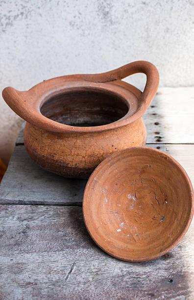 istock Clay pot on wooden 521200193