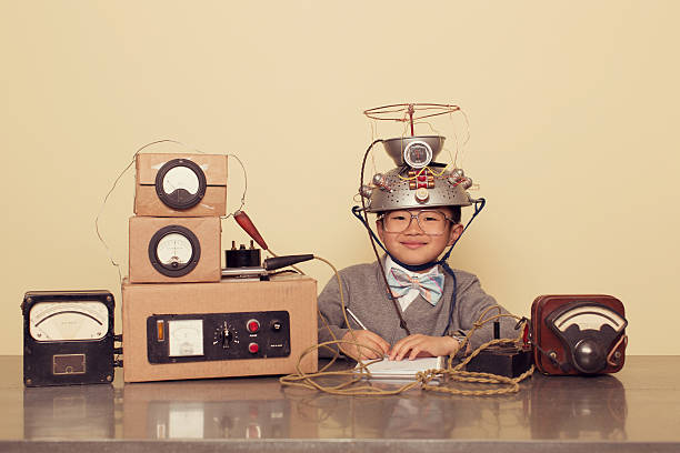 istock Japanese Nerd Boy Wearing Mind Reading Helmet 521200376