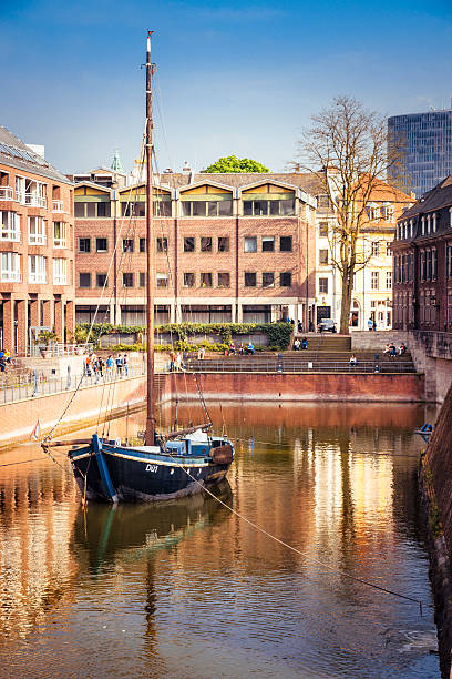 Promenade and Rhine River in Cologne, Germany. Composite photo