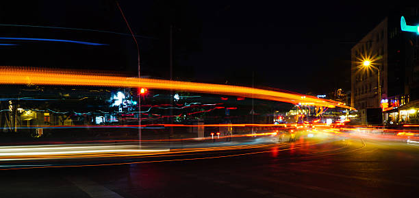 istock Abstract Tail Lights of Some Cars at Night Time 521201880