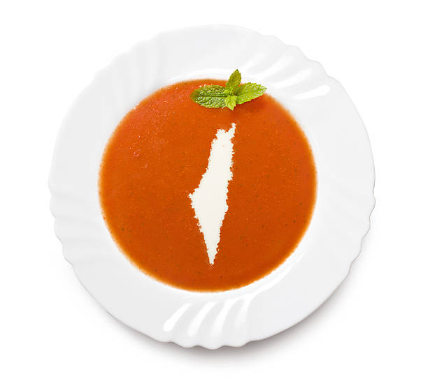 istock Plate with tomatosoup and cream (shape of Israel) 521202027