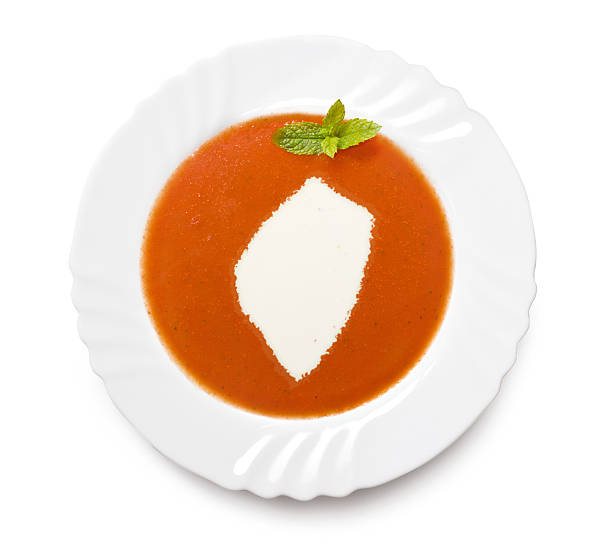istock Plate with tomatosoup and cream (shape of Swaziland) 521202087