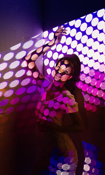 istock Woman covered by bokeh lights 521203270