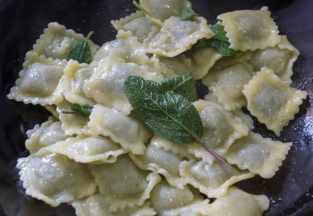istock Italian pasta called ravioli with sage and butter 521203450