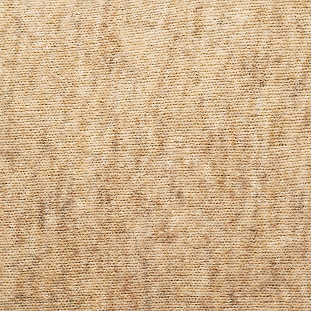 istock Beige knitted cloth fragment 521203646
