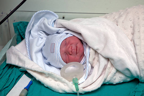 istock newborn first medical exam 521204003