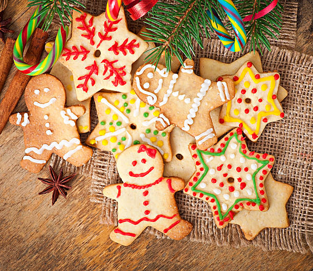 istock Christmas gingerbread cookies on a wooden background 521204615