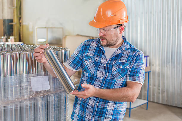 istock Worker in safety helmet at the storage 521204710