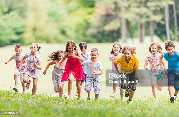 Children Running In The Park Stock Photo - Download Image Now - Activity, Boys, Child