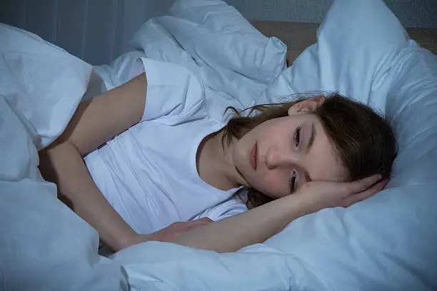 Innocent Girl In Bedroom Having Sleeplessness Night