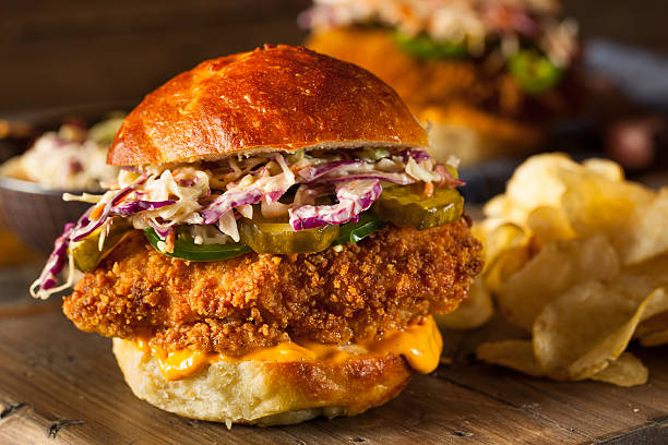 Southern Country Fried Chicken Sandwich Southern Country Fried Chicken Sandwich with Mayo and Jalapenos coleslaw stock pictures, royalty-free photos & images