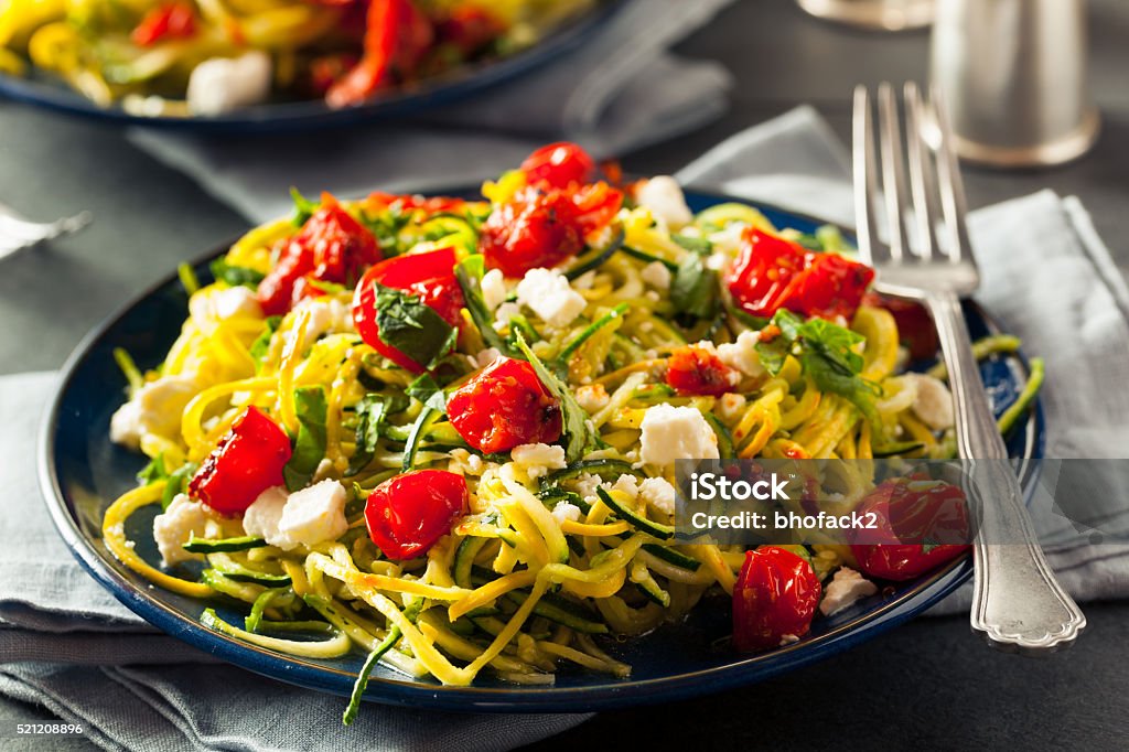 Homemade Zucchini Noodles Zoodles Homemade Zucchini Noodles Zoodles Pasta with Tomatos and Feta Zucchini Stock Photo