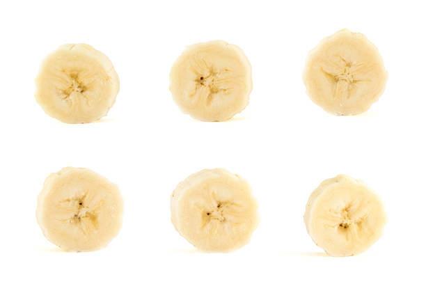 istock Six banana slices set over white background 521209036