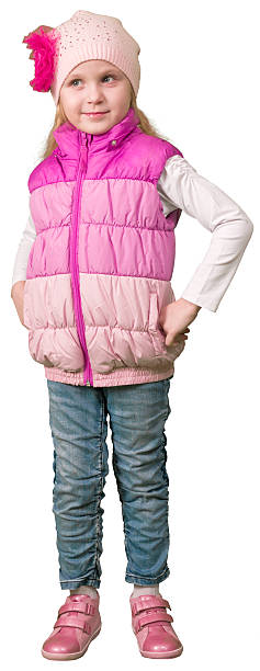 istock Cute little girl standing isolated on white background 521211356