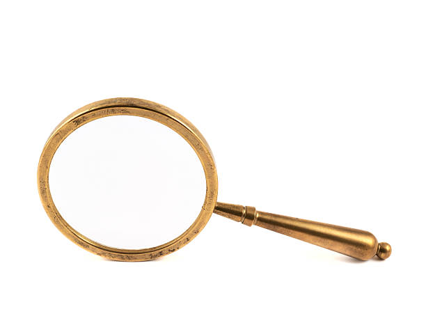 istock Old metal magnifying glass isolated 521211968