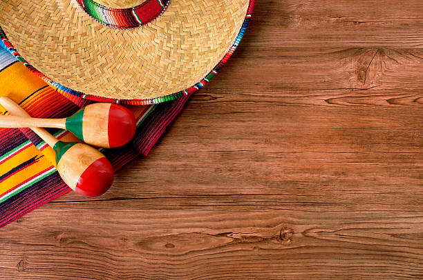 istock Mexico Cinco de Mayo wood background Mexican hat 521212230