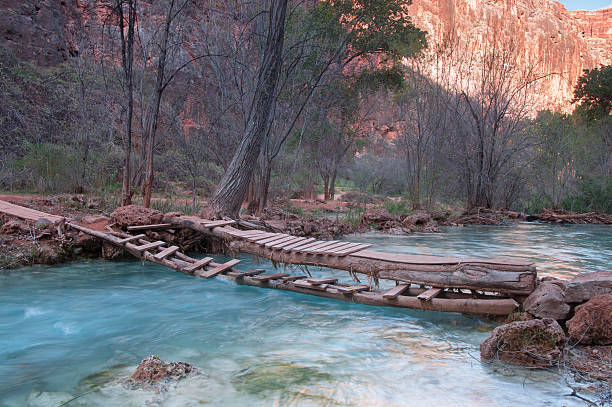 Little wooden bridge over mountain river Little wooden bridge over mountain river havasu creek stock pictures, royalty-free photos & images