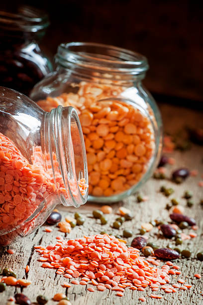 istock Red lentils in a glass jar, bean mix 521213108