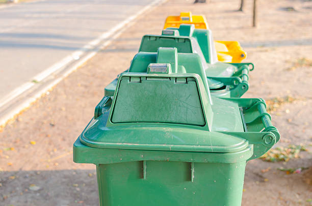 istock green and yellow bin in park 521221888