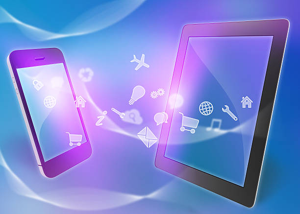 istock flying icons of the mobile phone into a tablet. 521226533