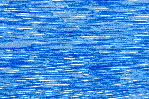 blue marker doodles on white paper background