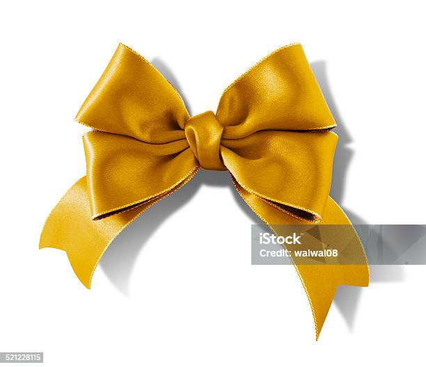 Double Bow Gold Ribbon Isolated On White Background Stock Photo - Download Image Now