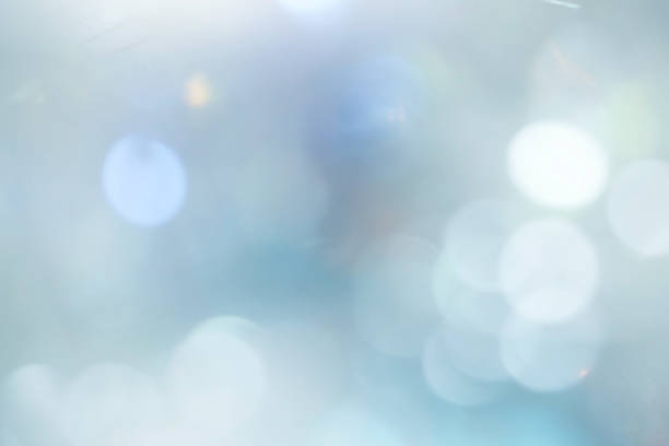 istock Abstract Christmas twinkled bright background with bokeh defocused silver lights 521230315