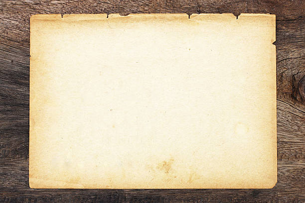 istock Brown paper on wood 521230753