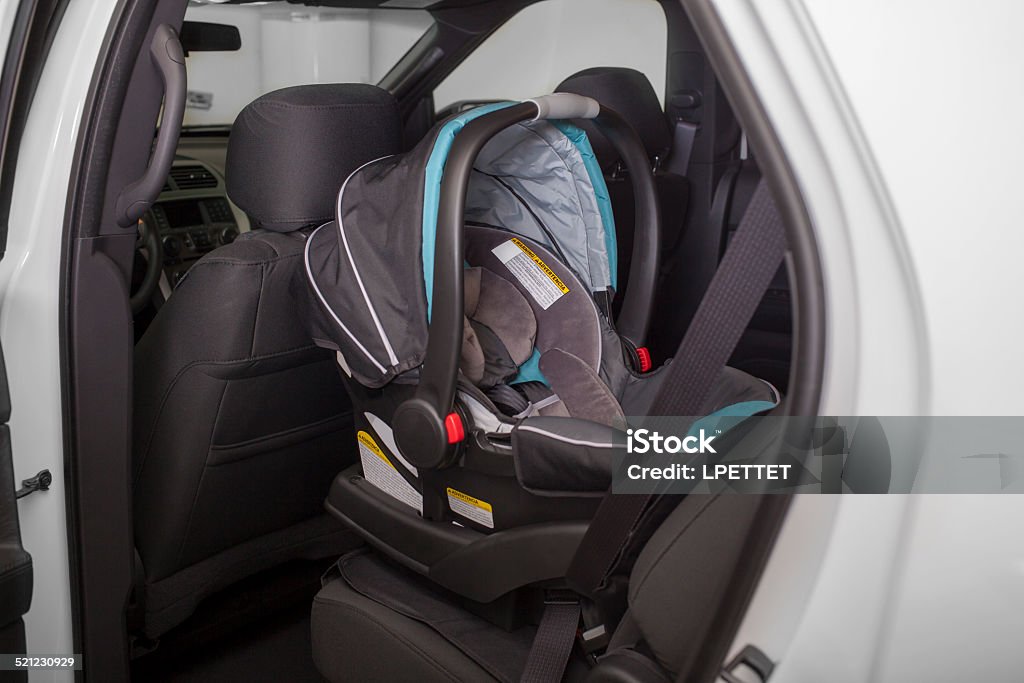 Seggiolino neonato in auto - Foto stock royalty-free di Seggiolino per auto
