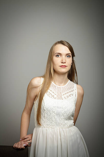 istock Young woman in white. 521233029